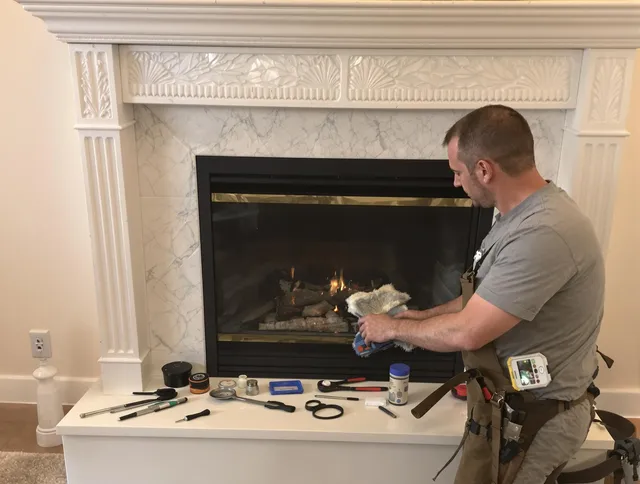 Sunrise Chimney Sweep performing fireplace maintenance in Sunrise, FL
